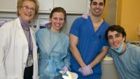 dental students and faculty member